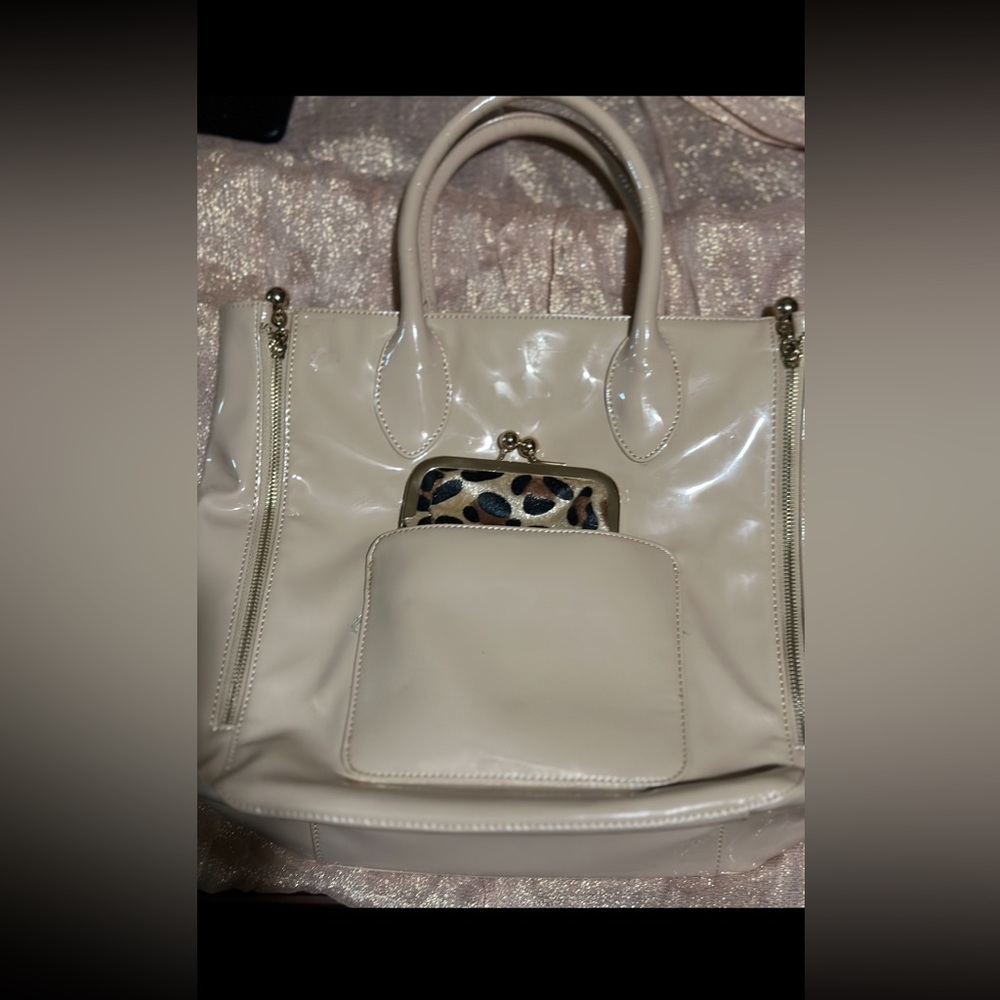 Charming Charlie’s leopard and beige purse